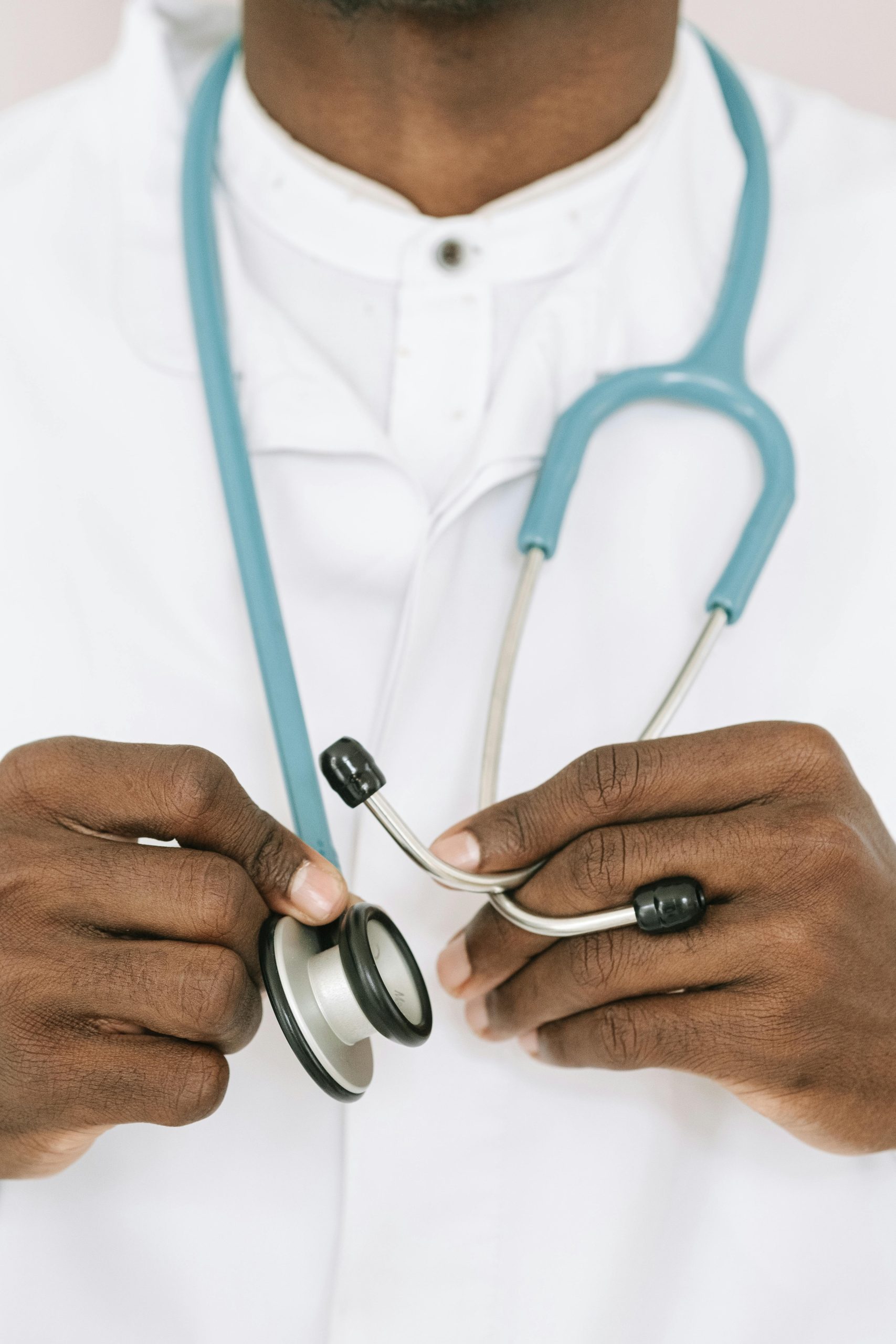 Physician Holding Stethoscope